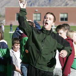 Colton Christianson from Spanish Fork Junior High throws the ball 40 feet 8 inches in the softball throw event at the Extravaganza.