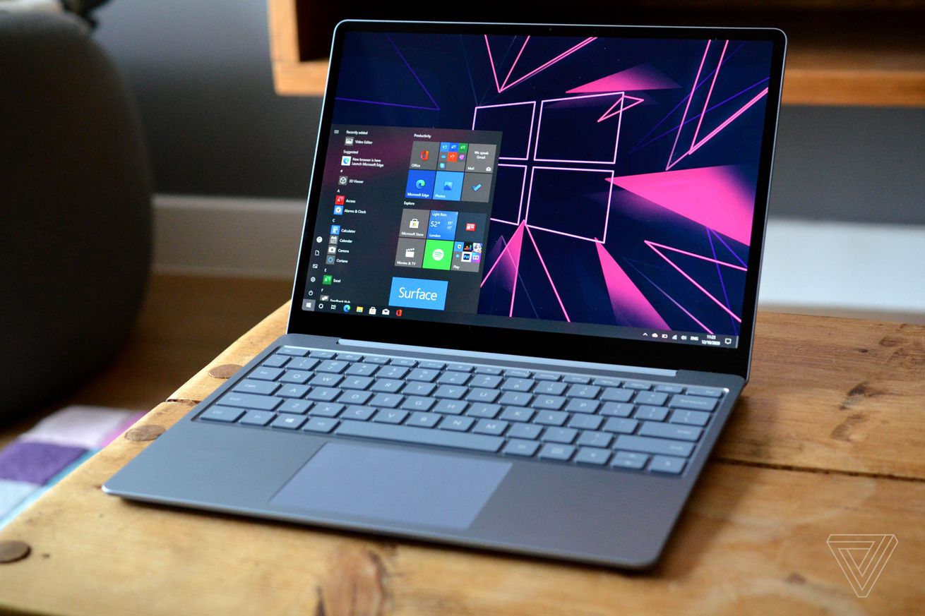 The Surface Laptop Go on a table angled slightly to the left.