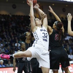 Brigham Young Cougars forward Kalani Purcell (32) tries to shoot over Santa Clara Broncos guard Brooke Gallaway (22) during the WCC tournament in Las Vegas Monday, March 7, 2016. BYU won 87-67.