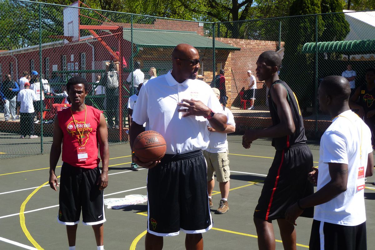Alonzo Mourning coaches the camps big men on how to handle the low post.
