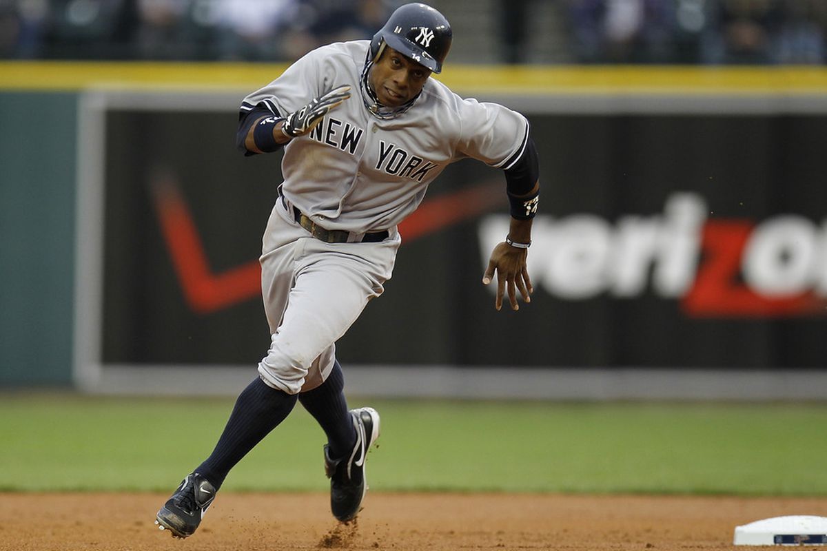 DETROIT, MI - MAY 02:  Curtis Granderson #14 of the New York Yankees runs to third base while playing the Detroit Tigers at Comerica Park on May 2, 2011 in Detroit, Michigan.  (Photo by Gregory Shamus/Getty Images)