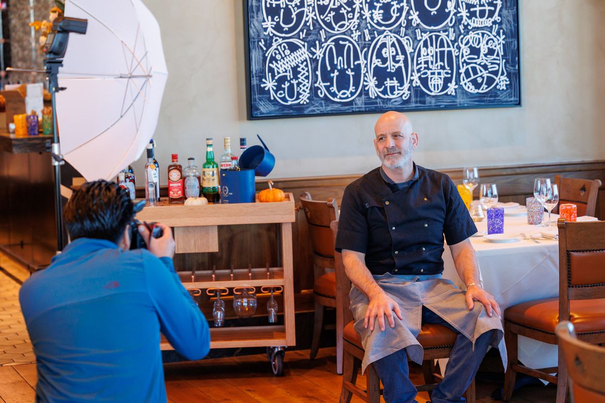 Marc Vetri poses at a table.