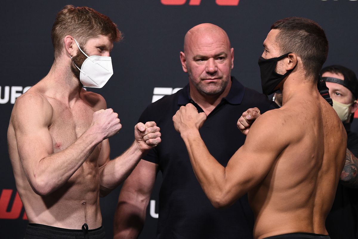 Opponents Cole Smith and Hunter Azure face off during the UFC Fight Night weigh-in at UFC APEX on September 04, 2020 in Las Vegas, Nevada.