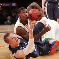 Brigham Young Cougars forward Nate Austin (33) and Baylor Bears guard A.J. Walton (22) fight for the ball during the NIT Final Four in New York City Tuesday, April 2, 2013.