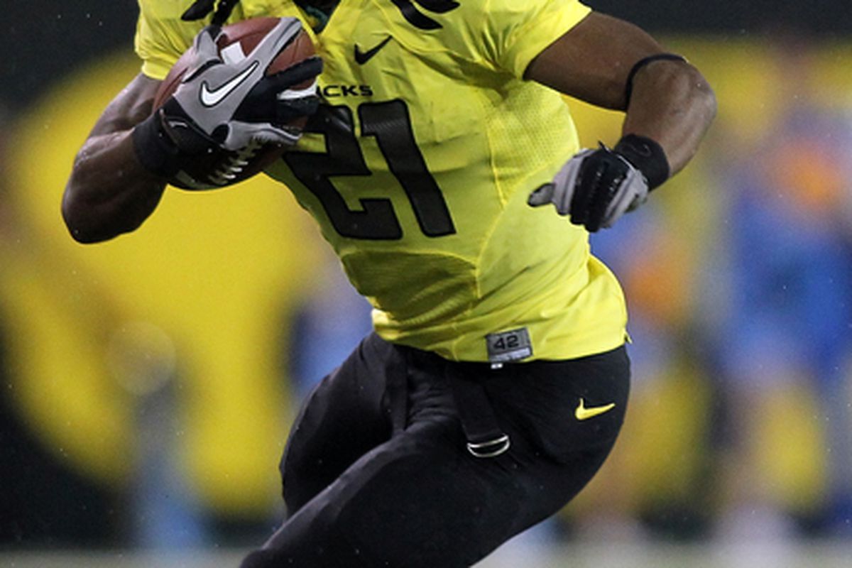 EUGENE OR - OCTOBER 21:  LaMichael James #21 of the Oregon Ducks runs the ball against the UCLA Bruins on October 21 2010 at the Autzen Stadium in Eugene Oregon.  (Photo by Jonathan Ferrey/Getty Images)