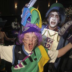 Fanatic Jazz fans Carter Wood, left, and Josh Johnson scream and cheer during tryouts for the new Jazz Rowdies club Tuesday at the Larry H. Miller Megaplex 12 at The Gateway in Salt Lake City. Winners will receive free tickets to Jazz games and sit in their own section with other Rowdies.