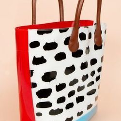 <b>Tsumori Chisato</b> vinyl tote at Opening Ceremony, <a href="https://www.openingceremony.us/products.asp?menuid=2&catid=24&designerid=7&productid=59612">$210</a>