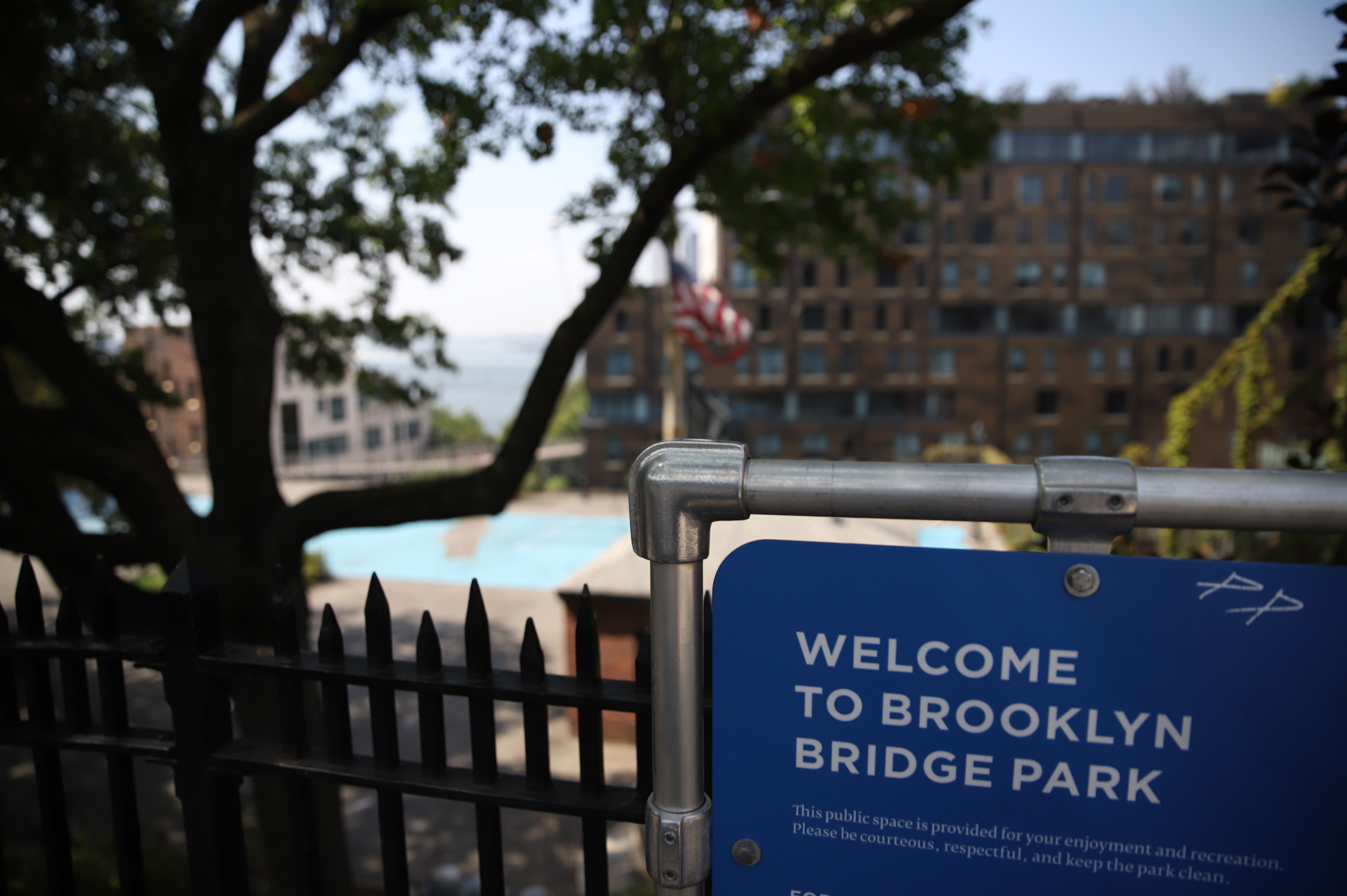 The Pierhouse building can be seen in the distance from one of Brooklyn Bridge Park’s entrances.