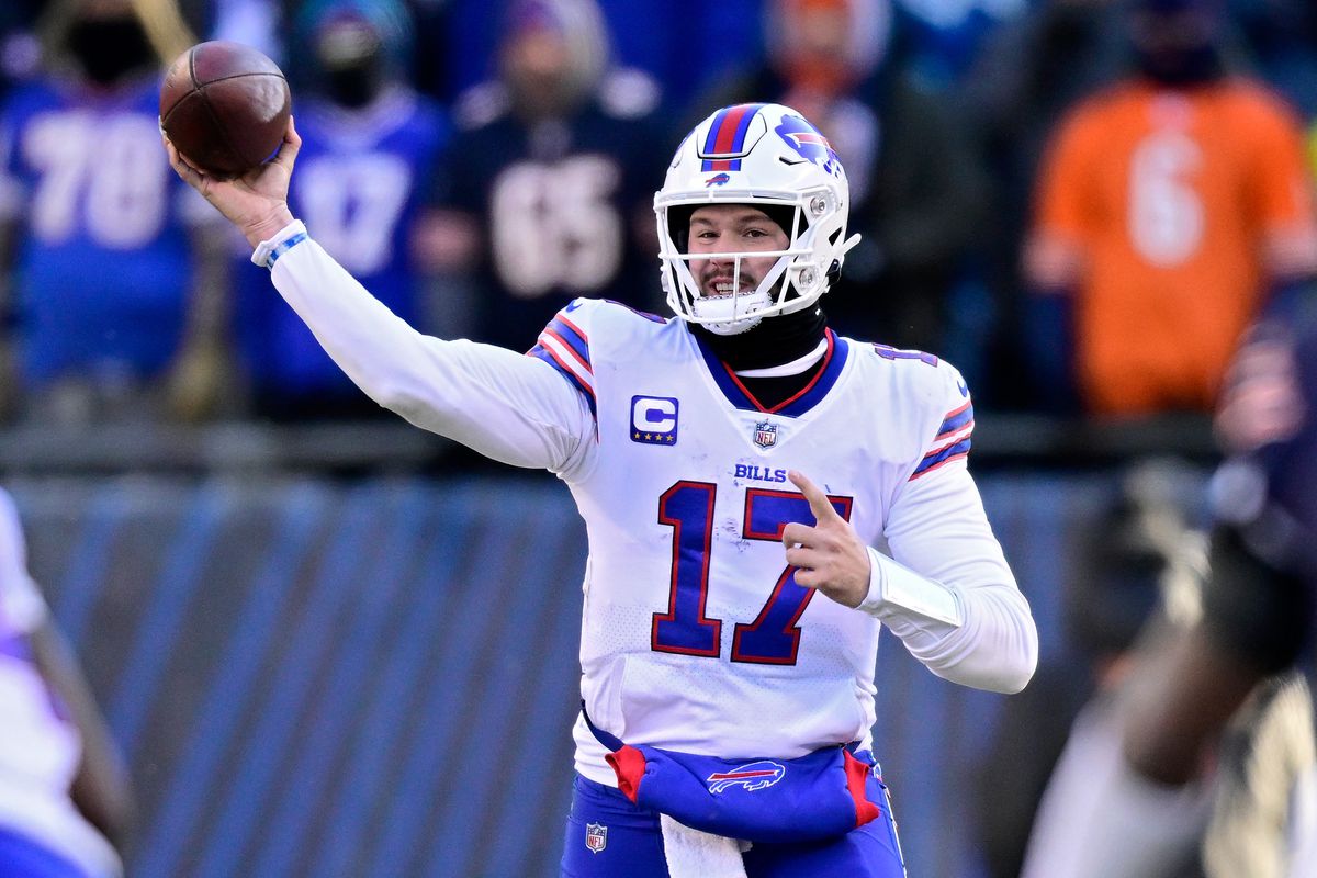 CHICAGO, ILLINOIS - DECEMBER 24: Josh Allen #17 of the Buffalo Bills throws a pass during the second half in the game against the Chicago Bears at Soldier Field on December 24, 2022 in Chicago, Illinois.