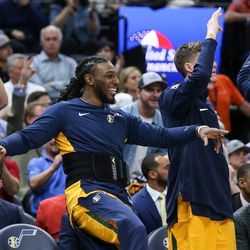 Utah Jazz forward Jae Crowder (99) and teammates celebrate a point against the Detroit Pistons at Vivint Smart Home Arena in Salt Lake City on Tuesday, March 13, 2018.