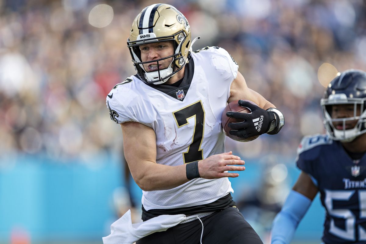 Taysom Hill #7 of the New Orleans Saints runs the ball during a game against the Tennessee Titans at Nissan Stadium on November 14, 2021 in Nashville, Tennessee.