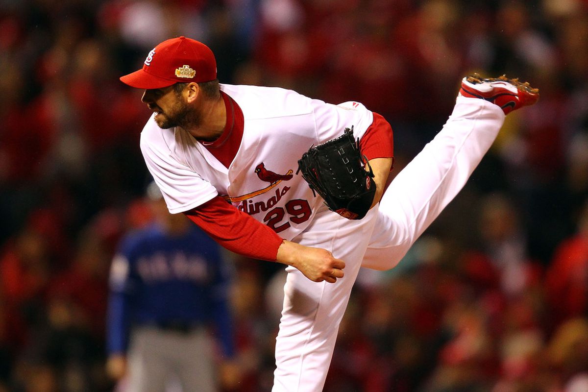 ST LOUIS, MO - OCTOBER 19: Chris Carpenter #29 of the St. Louis Cardinals pitches during Game One of the MLB World Series against the Texas Rangers at Busch Stadium on October 19, 2011 in St Louis, Missouri.  (Photo by Dilip Vishwanat/Getty Images)