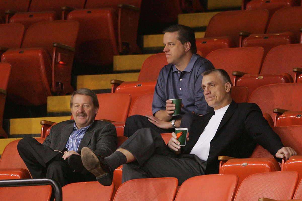 (L-R) Peter Luukko, Barry Hanrahan and Paul Holmgren watch practice at Mellon Arena in 2008.