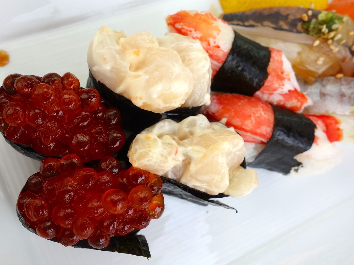 Salmon-roe, scallop, crab, and mackerel nigiri