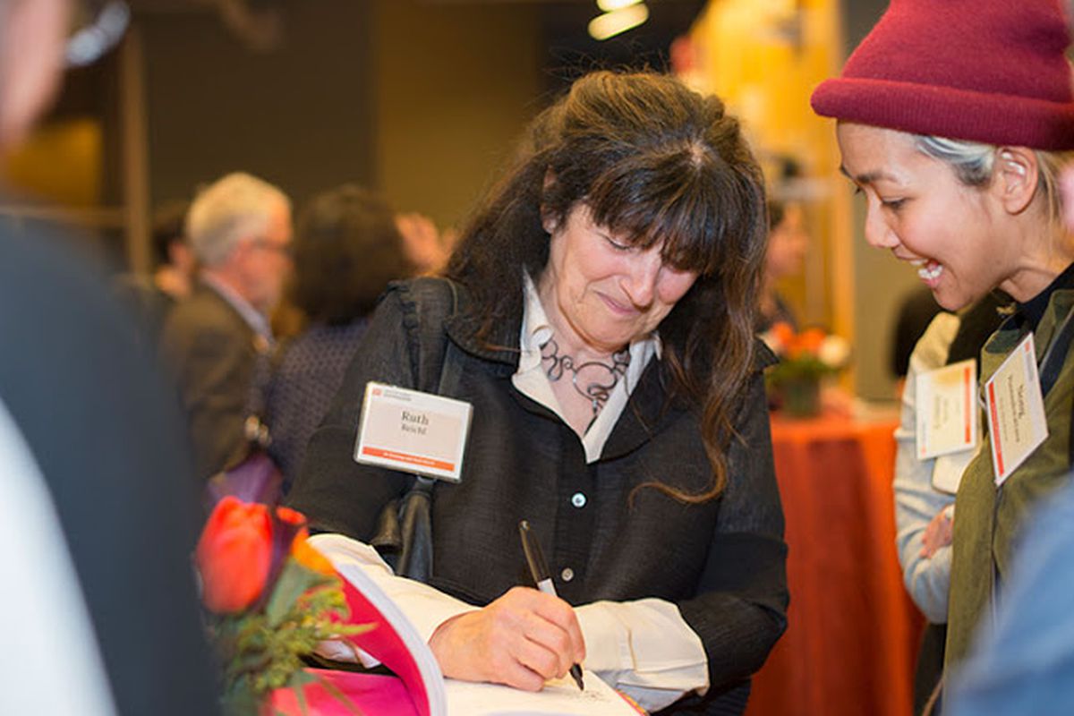 Ruth Reichl signs a book for Nong Poonsukwattana