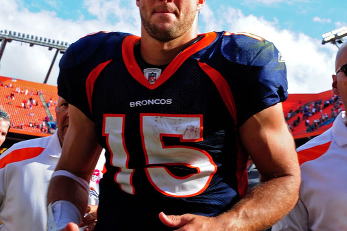 MIAMI GARDENS, FL - OCTOBER 23: Tim Tebow #15 of the Denver Broncos heads off the field after the game against the Miami Dolphins at Sun Life Stadium on October 23, 2011 in Miami Gardens, Florida. (Photo by Scott Cunningham/Getty Images)