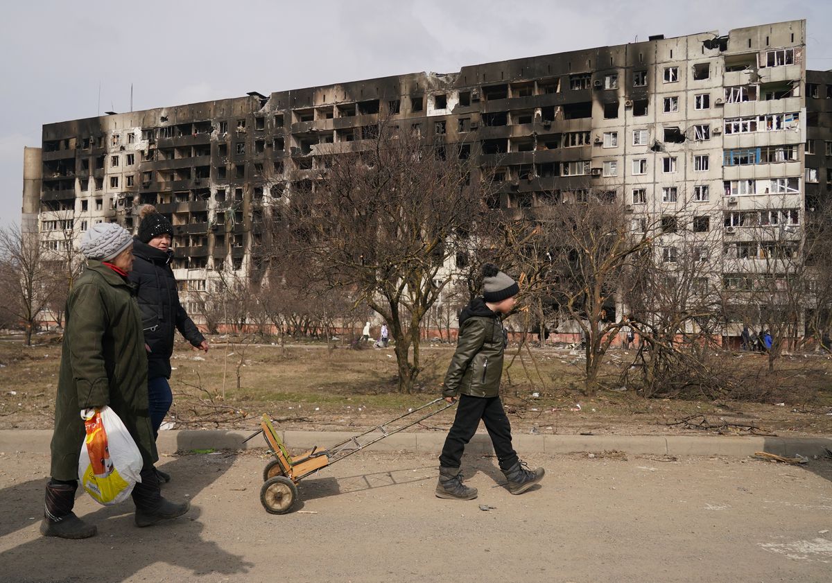Damaged buildings are seen as civilians are evacuated from Mariupol, Ukraine.