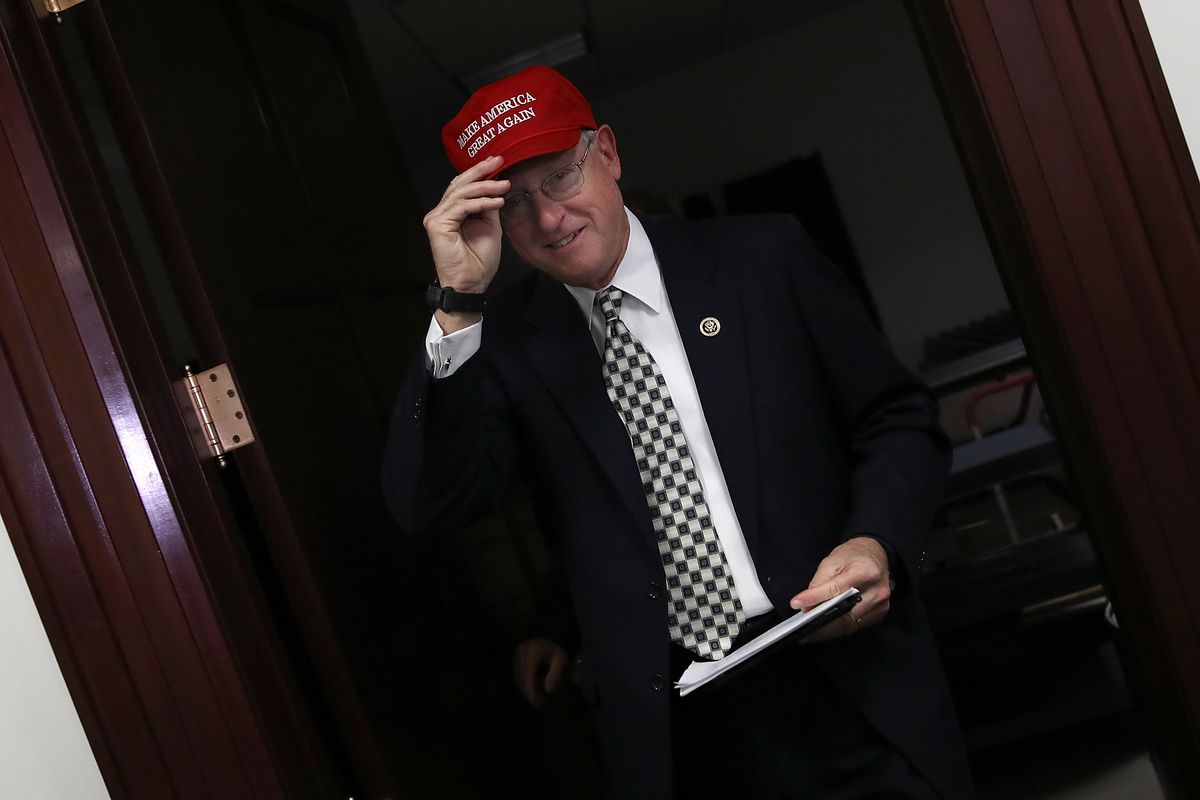 Rep. Mike Conaway (R-TX) adjusts his ‘Make America Great Again’ hat while leaving a meeting at the U.S. Capitol November 15, 2016 in Washington, DC. The hats, a symbol of U.S. President-elect Donald Trump, were distributed during the weekly Republican cau
