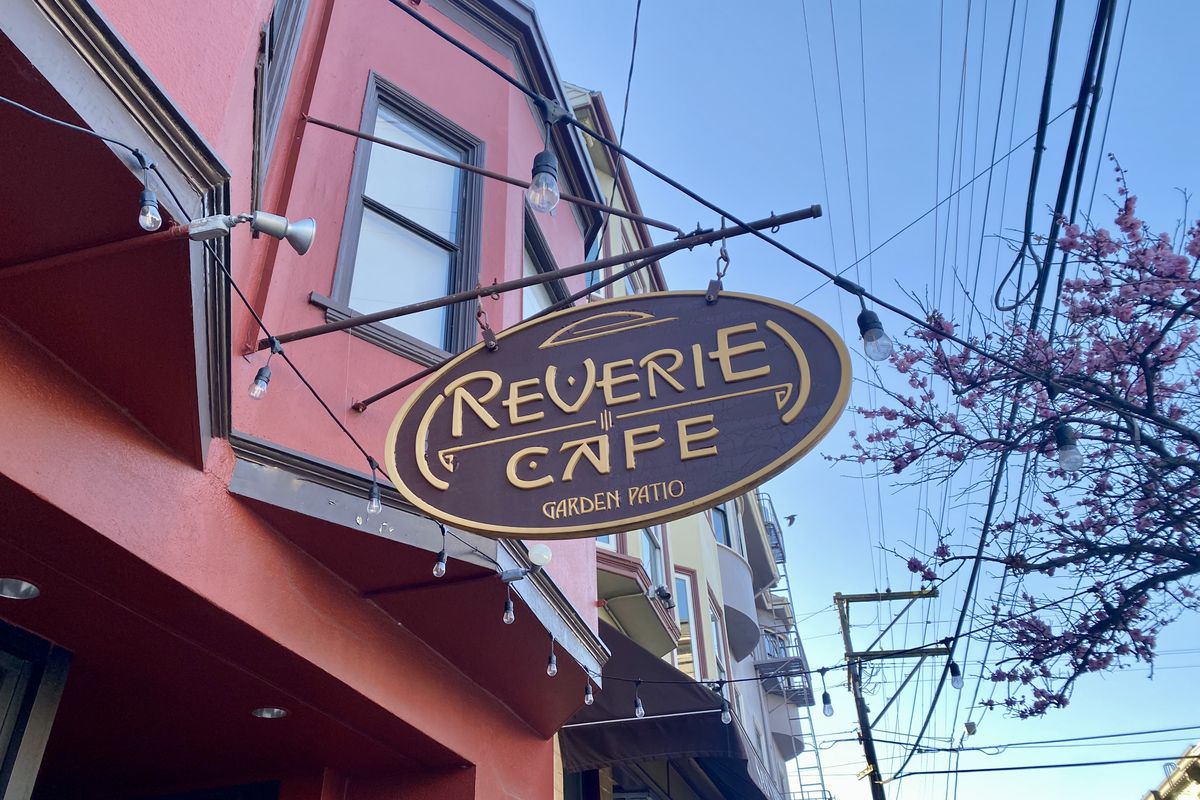 A sign outside Reverie Cafe.