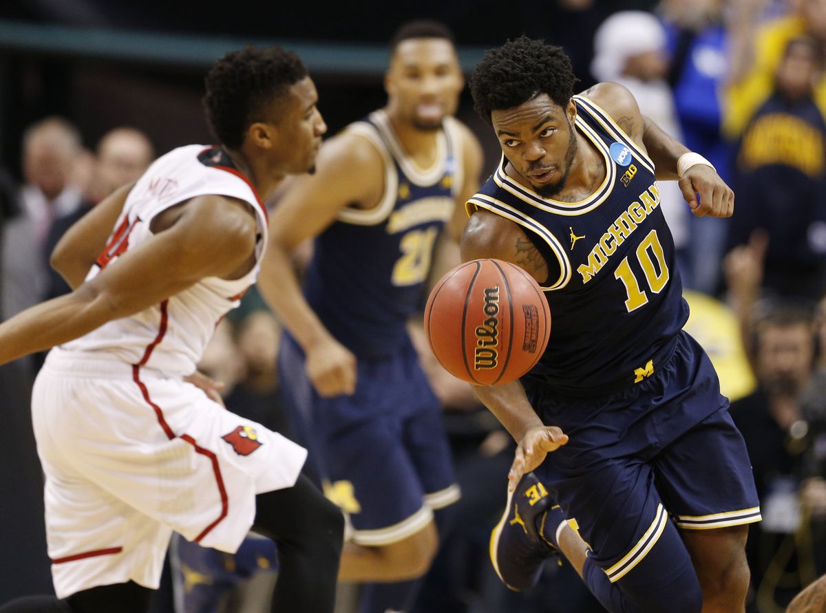 NCAA Basketball: NCAA Tournament-Second Round-Michigan vs Louisville