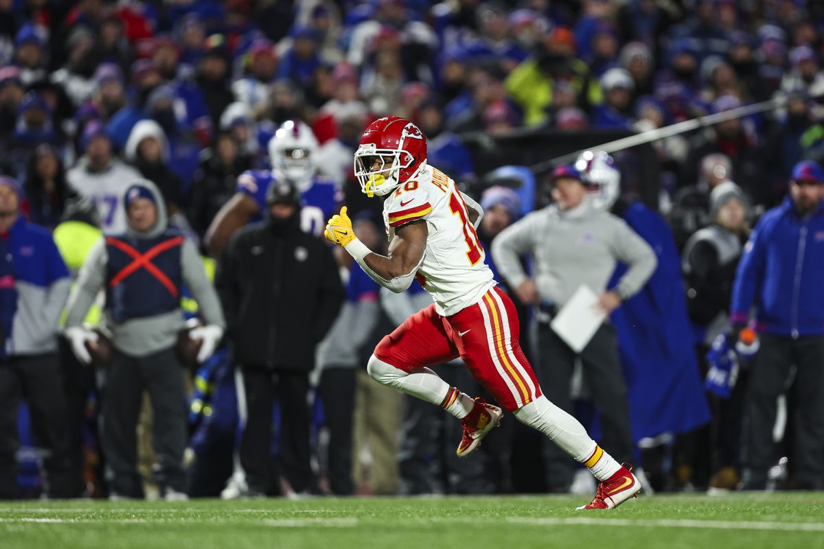 Isiah Pacheco #10 of the Kansas City Chiefs runs the ball during an NFL divisional round playoff football game against the Buffalo Bills at Highmark Stadium on January 21, 2024 in Orchard Park, New York.