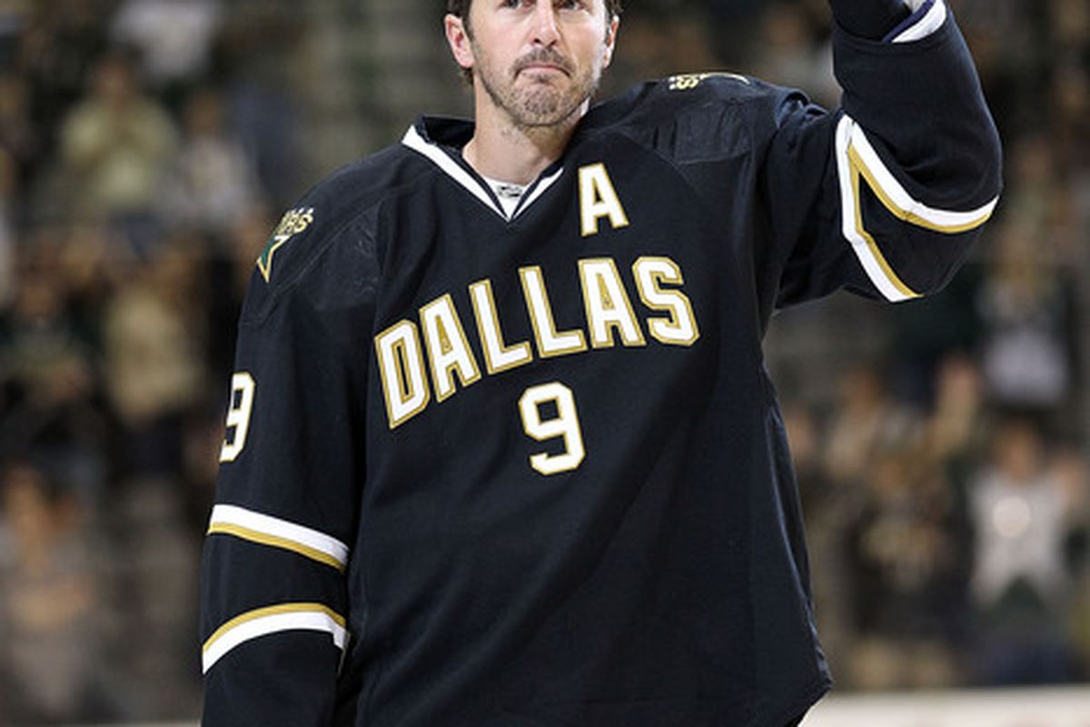 DALLAS - APRIL 08:  Center Mike Modano #9 of the Dallas Stars waves to the crowd after his last home game of the season against the Anaheim Ducks at American Airlines Center on April 8, 2010 in Dallas, Texas.  (Photo by Ronald Martinez/Getty Images)