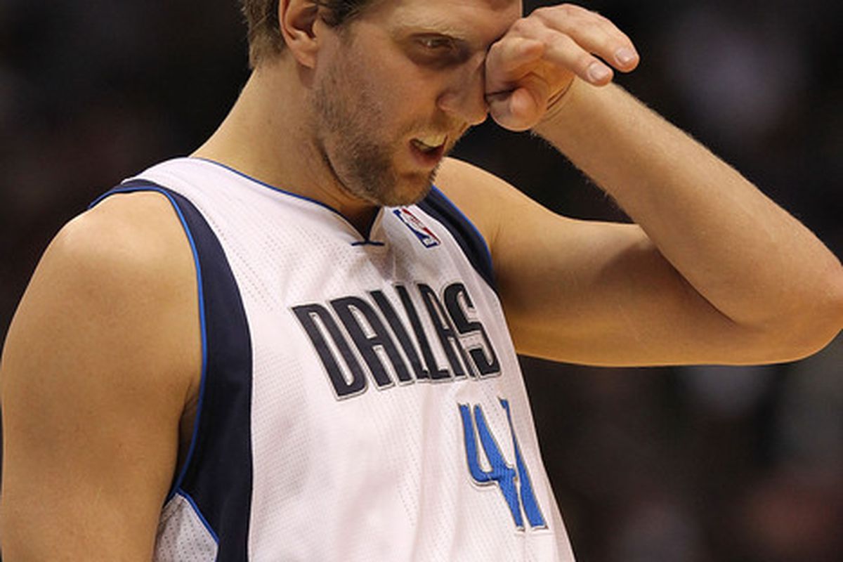 Aching knee, scratch on the face, blurry vision...Dirk Nowitzki is a Warrior.