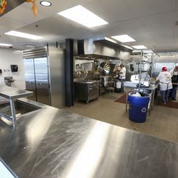 Staff works in the kitchen of the new Gail Miller Resource Center in Salt Lake City during an open house for the public on Friday, Sept. 6, 2019.