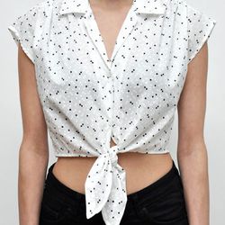 The Tie Top in the polka dot print, <a href="http://shop.alterbrooklyn.com/ALTW101.html">$68</a>