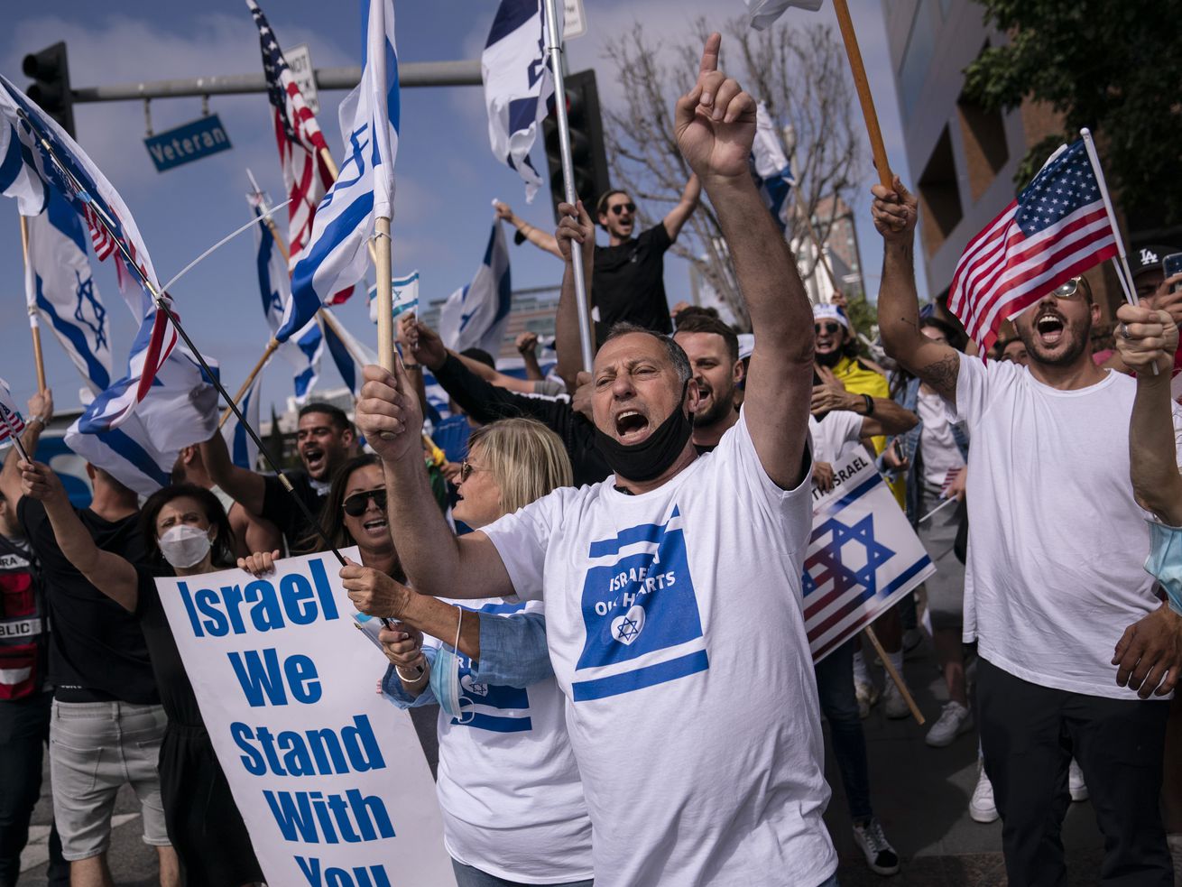 Pro-Israel supporters chant slogans during a rally in support of Israel outside the Federal Building in Los Angeles, Wednesday, May 12, 2021. A larger debate is playing out nationwide among many U.S. Jews who are divided over how to respond to the violence and over the disputed boundaries for acceptable criticism of Israeli policies.