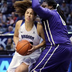 Brigham Young Cougars forward Kalani Purcell (32) moves to the basket with Washington Huskies forward/center Chantel Osahor (0) defending during NCAA basketball In Provo on Thursday, Dec. 22, 2016.