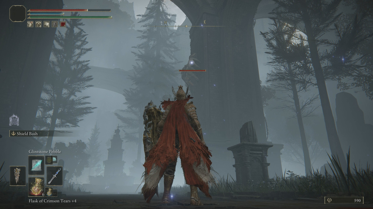 Looking at a giant hand enemy in Elden Ring’s Caria Manor garden