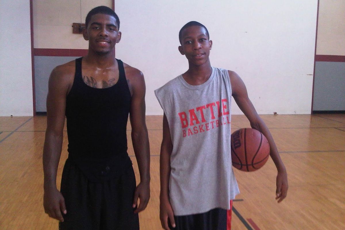 Tyus Battle (right) posing with Kyrie Irving