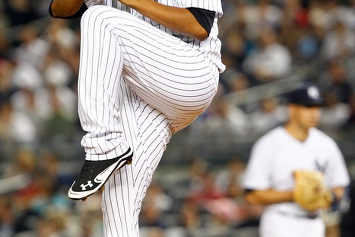 Apr. 15, 2012; Bronx, NY, USA; New York Yankees starting pitcher Ivan Nova pitches during the first inning against the Los Angeles Angels at Yankee Stadium. Mandatory Credit: Debby Wong-US PRESSWIRE