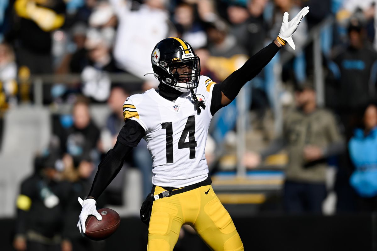 George Pickens #14 of the Pittsburgh Steelers celebrates after making a catch against the Carolina Panthers during the second quarter of the game at Bank of America Stadium on December 18, 2022 in Charlotte, North Carolina.