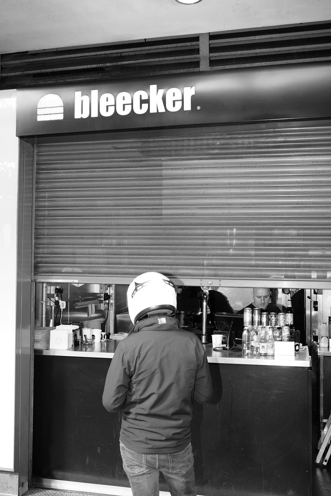 A delivery driver waits outside Bleecker Burger at Old Spitalfields Market