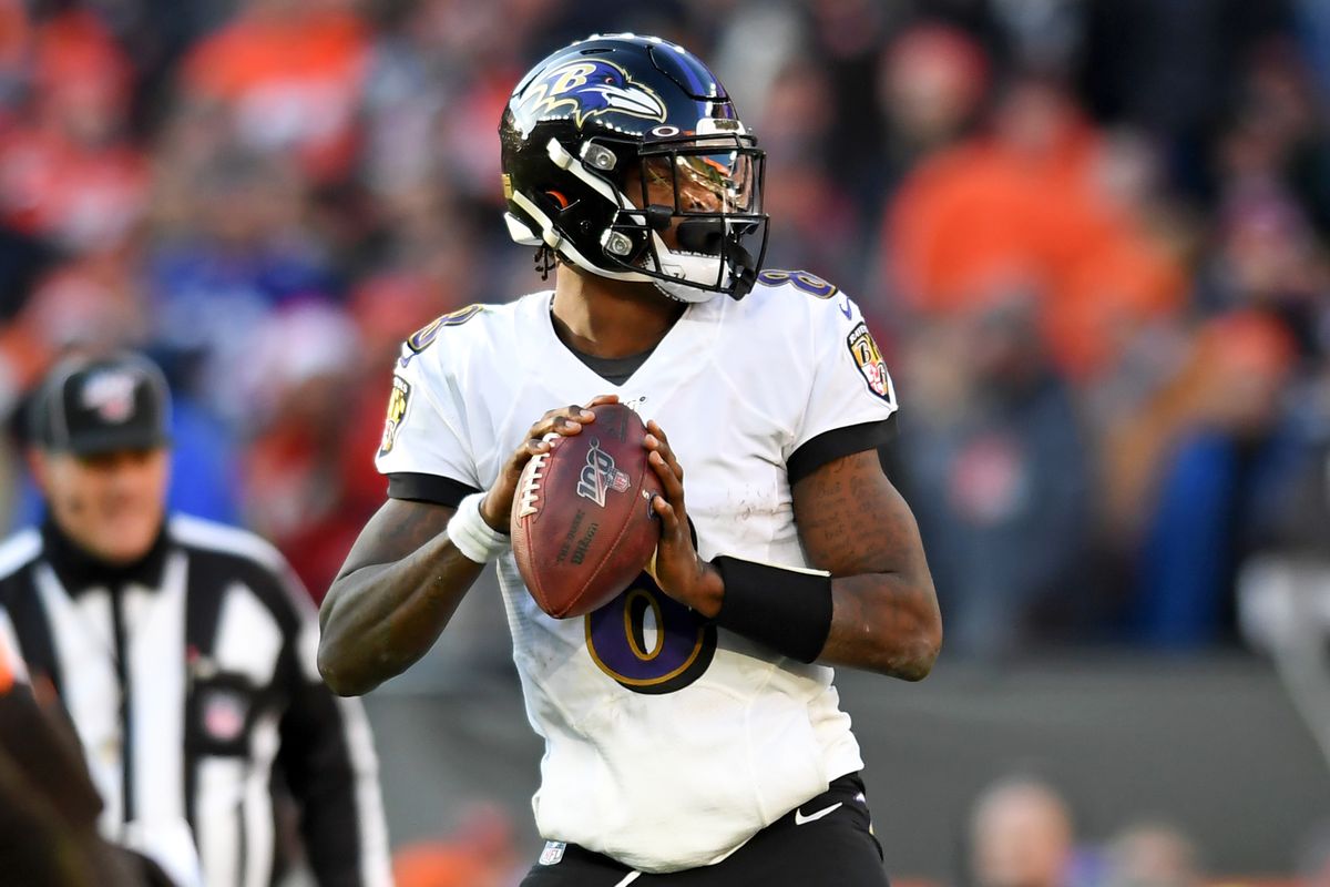 Quarterback Lamar Jackson of the Baltimore Ravens drops back to pass in the fourth quarter of a game against the Cleveland Browns on December 22, 2019 at FirstEnergy Stadium in Cleveland, Ohio.