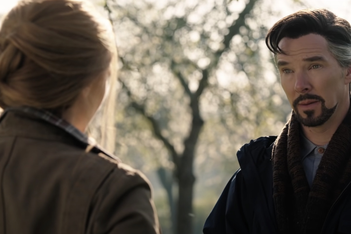 Stephen Strange and Wanda Maximoff having a chat in an orchard.