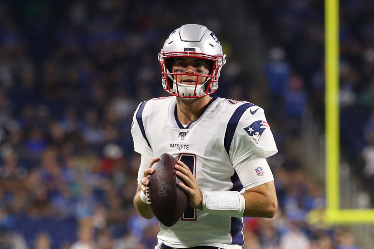 Jarett Stidham of the New England Patriots throws a second quarter pass while playing the Detroit Lions during a game at Ford Field on August 08, 2019 in Detroit, Michigan.