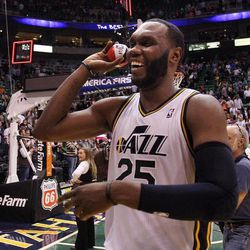 Al Jefferson of the Utah Jazz throws balls to the crowd after helping defeat Minnesota during NBA basketball in Salt Lake City, Friday, April 12, 2013. According to Comcast Sports Net, the Boston Celtics tried to trade for Jefferson and/or Paul Millsap before the trade deadline.
