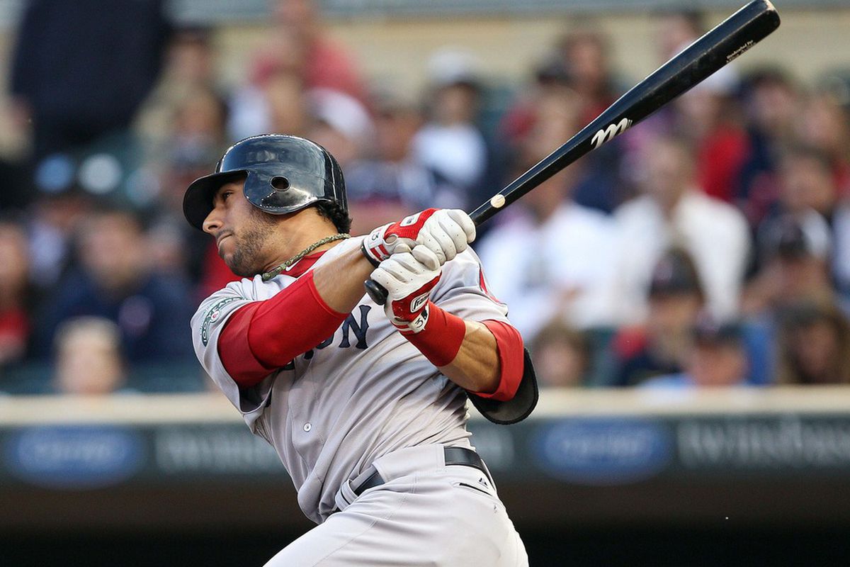 Apr 24, 2012; Minneapolis, MN, USA: Boston Red Sox third baseman Mike Aviles (3) hits a double in the first inning against the Minnesota Twins at Target Field. Mandatory Credit: Jesse Johnson-US PRESSWIRE