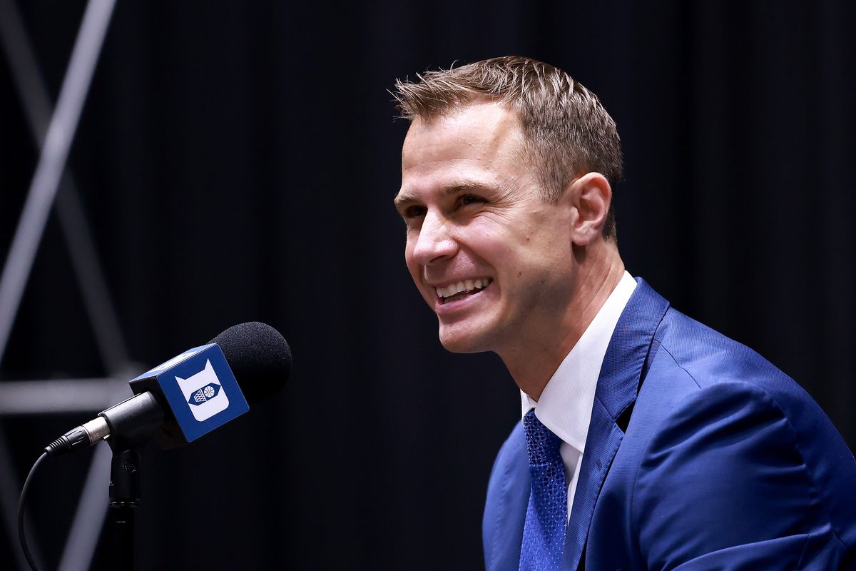 Jon Scheyer speaks after being named the 20th coach of the Duke Blue Devils during a press conference at Cameron Indoor Stadium.