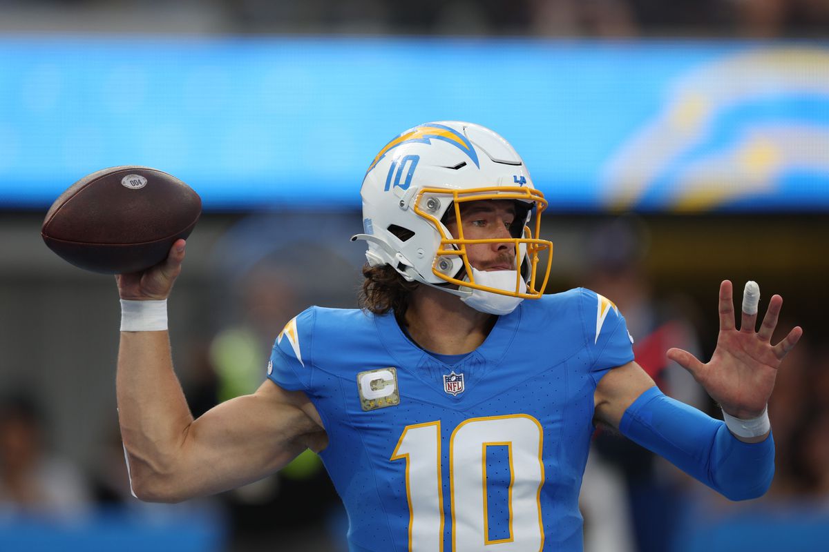 INGLEWOOD, CALIFORNIA - NOVEMBER 12: Justin Herbert #10 of the Los Angeles Chargers passes the football during a 41-38 loss to the Detroit Lions at SoFi Stadium on November 12, 2023 in Inglewood, California.