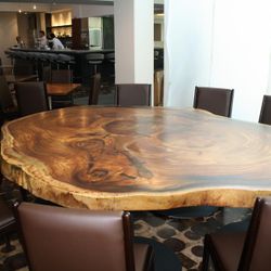 This table is made from 4 Indonesian selebuan redwoods that have been fused together. 