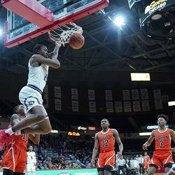DePaul Prep’s Perry Cowan (11) gets a dunk against Bogan in the 3A semi-finals, Friday 03-15-19. Worsom Robinson/For the Sun-Times