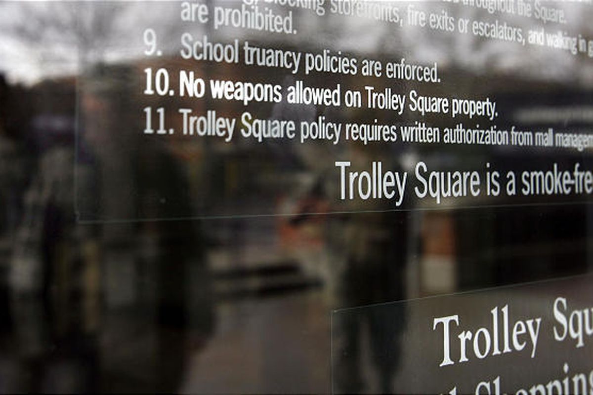 Trolley Square mall in Salt Lake has signs saying guns aren't allowed on its premises.   