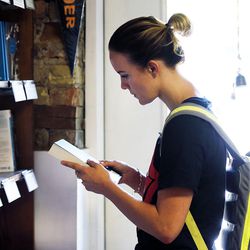Brittany Anderson looks at books at The King's English Bookshop in Salt Lake City on Wednesday, Aug. 23, 2017.