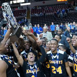 Providence St. Mel raises its Class 1A state championship trophy Saturday 03-09-19. Worsom Robinson/For the Sun-Times.