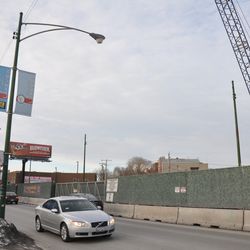The city has begun removing the street lights on the east side of Clark Street. The light head, and light arm, are already gone. Only the light pole remains - 