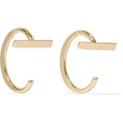A modern spin on traditional gold hoops, these dainty Melissa Joy Manning earrings can be worn two ways (with the bar in front or back) for different looks.